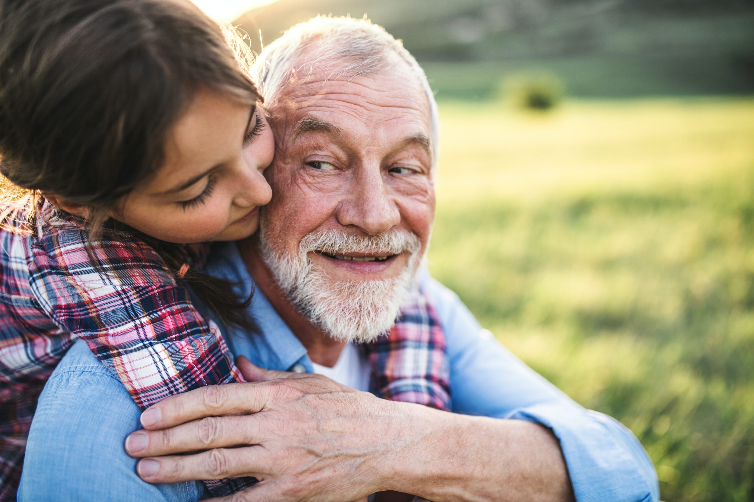 Senior laughing with grandchild