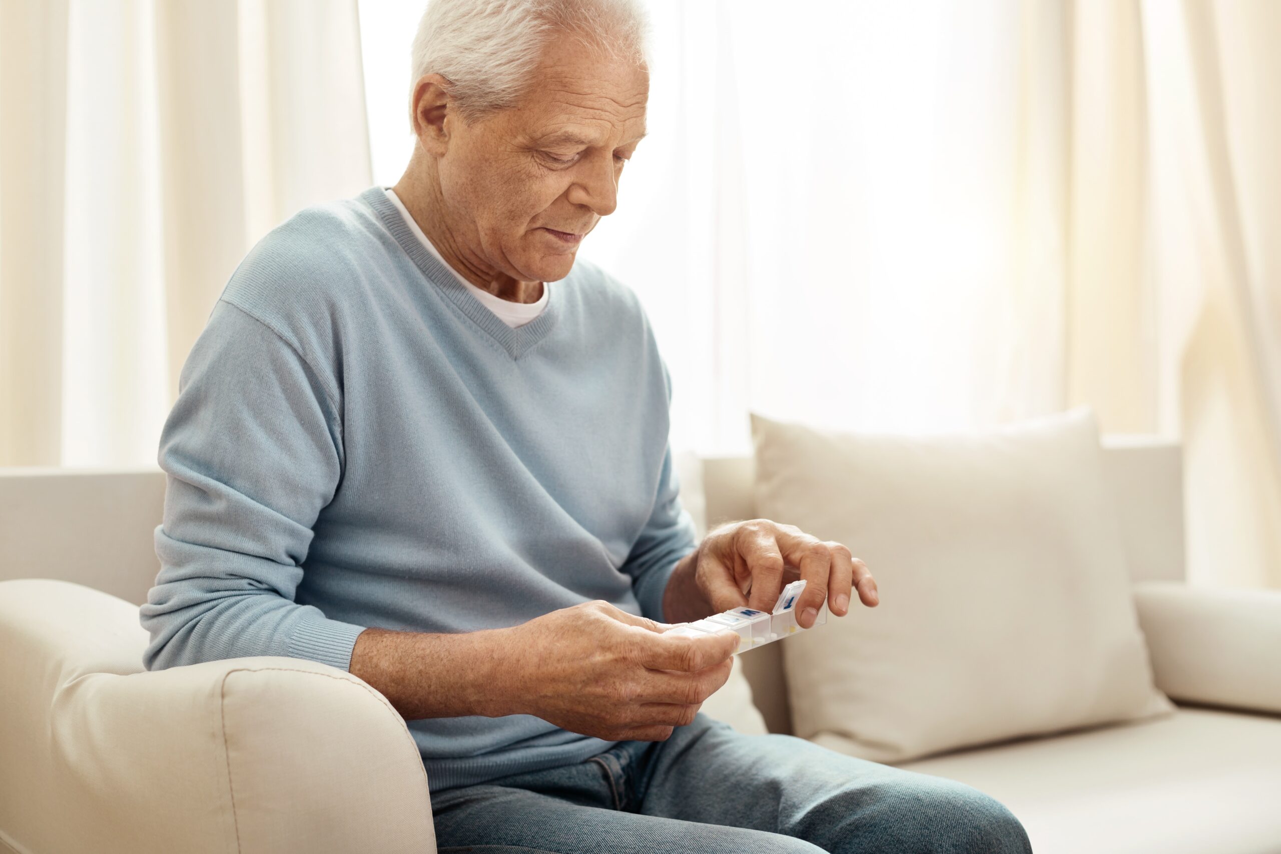 Senior holding pill oragnizer
